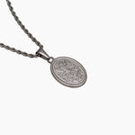 Silver St. Michael necklace with a detailed pendant on a white background