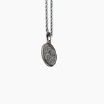 Silver St. Michael necklace with a pendant on a white background